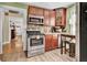 Small kitchen with stainless steel appliances at 953 Garibaldi Sw St, Atlanta, GA 30310