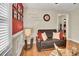 Spacious living room with hardwood floors and red accent wall at 953 Garibaldi Sw St, Atlanta, GA 30310