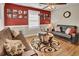 Cozy living room with hardwood floors and accent wall at 953 Garibaldi Sw St, Atlanta, GA 30310