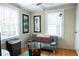 Bright sitting room with hardwood floors, natural light, and comfortable seating at 953 Garibaldi Sw St, Atlanta, GA 30310