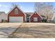 Charming brick-accented home with a well-manicured lawn and attached two-car garage at 1020 Sunhill Dr, Lawrenceville, GA 30043