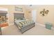 Guest bedroom with gray platform bed and built-in drawers at 1553 Rolling Meadows Dr, Mcdonough, GA 30253