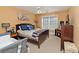 Comfortable bedroom with queen-size bed and a large window at 1553 Rolling Meadows Dr, Mcdonough, GA 30253