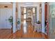 Bright and spacious entryway with hardwood floors and view of the living room at 1553 Rolling Meadows Dr, Mcdonough, GA 30253