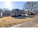 Two-story brick home with a well-maintained lawn at 1553 Rolling Meadows Dr, Mcdonough, GA 30253