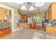 Eat-in kitchen with wood cabinets, hardwood floors and island at 1553 Rolling Meadows Dr, Mcdonough, GA 30253