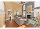 Spacious living room with hardwood floors, fireplace, and high ceilings at 1553 Rolling Meadows Dr, Mcdonough, GA 30253