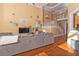 Spacious living room with hardwood floors, and two-story high ceilings at 1553 Rolling Meadows Dr, Mcdonough, GA 30253