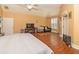 Main bedroom with hardwood floors, sitting area and TV at 1553 Rolling Meadows Dr, Mcdonough, GA 30253