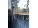 Back deck overlooking wooded backyard at 911 David Dr, Lawrenceville, GA 30046