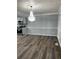 Bright dining area with hardwood floors and a crystal chandelier at 911 David Dr, Lawrenceville, GA 30046