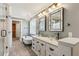Elegant bathroom with double vanity, soaking tub, and glass shower at 213 Pine Crest Dr, Cumming, GA 30040