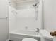 Bathroom with shower/tub combo and white tile at 213 Pine Crest Dr, Cumming, GA 30040