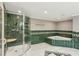 Bathroom with walk-in shower and corner jacuzzi tub at 213 Pine Crest Dr, Cumming, GA 30040