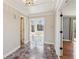 Elegant entryway with marble flooring and access to other rooms at 213 Pine Crest Dr, Cumming, GA 30040