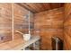 Relaxing wooden sauna with bench and bucket at 213 Pine Crest Dr, Cumming, GA 30040