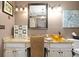 Bathroom vanity with granite countertop, decorative lighting, and a vessel sink at 3521 Southern Bay Ct, Snellville, GA 30039