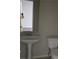 Bathroom featuring pedestal sink and toilet at 11329 Michelle Way, Hampton, GA 30228