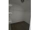 Walk-in closet with custom shelving and hardwood floors at 11329 Michelle Way, Hampton, GA 30228