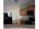 This kitchen is equipped with stainless steel appliances and granite countertops at 11329 Michelle Way, Hampton, GA 30228