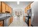 Modern kitchen with stainless steel appliances and a view of the dining area at 305 Thorntree Ln, Canton, GA 30115