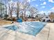 Large covered pool area, complete with a water slide, cabana, and outdoor seating at 305 Thorntree Ln, Canton, GA 30115