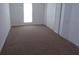 Spacious bedroom with ample closet space and neutral carpeting at 3091 Colonial Way # C1, Atlanta, GA 30341