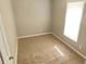 Bedroom with neutral walls and carpet at 5052 Central Church Rd, Douglasville, GA 30135