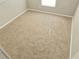 Empty bedroom with wall-to-wall carpet at 5052 Central Church Rd, Douglasville, GA 30135