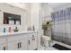 Bathroom with shower and updated vanity at 7037 Shangrila Trl, Riverdale, GA 30296
