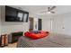 Main bedroom with a king-size bed and en-suite bathroom at 7037 Shangrila Trl, Riverdale, GA 30296