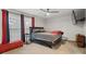 Spacious bedroom with a king-size bed and large window at 7037 Shangrila Trl, Riverdale, GA 30296