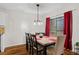 Dining area with hardwood floors and sliding glass door access at 7037 Shangrila Trl, Riverdale, GA 30296