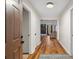 Bright entryway with hardwood floors leading to living room at 7037 Shangrila Trl, Riverdale, GA 30296