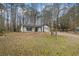 Ranch style home with a large backyard at 7037 Shangrila Trl, Riverdale, GA 30296