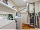 Laundry room with washer, dryer and shelving at 7037 Shangrila Trl, Riverdale, GA 30296