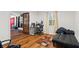 Home office with wood floors and built-in desk at 7037 Shangrila Trl, Riverdale, GA 30296