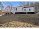 Back of house, featuring a deck and fenced yard at 2676 Old Toney Rd, Ellenwood, GA 30294