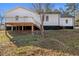 House exterior showcasing a deck and backyard at 2676 Old Toney Rd, Ellenwood, GA 30294