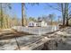 Front view of a charming house with picket fence at 2676 Old Toney Rd, Ellenwood, GA 30294