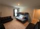 Cozy bedroom with a bunk bed, a love seat and a window with blinds at 3306 Loblolly Pine Way, Decatur, GA 30034