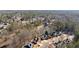 Aerial view of the house and the neighborhood near a pond at 5073 Kingsbridge Pass, Powder Springs, GA 30127