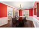 Bright dining room with hardwood floors, crown molding and views of the front yard at 5073 Kingsbridge Pass, Powder Springs, GA 30127