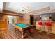 Finished basement featuring game area with pool table, bar, and seating at 5073 Kingsbridge Pass, Powder Springs, GA 30127