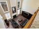 Top view of living room, with fireplace, tall windows, and hardwood floors at 5073 Kingsbridge Pass, Powder Springs, GA 30127