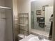 Bathroom with shower, shelving and vanity at 5396 Pennington Court, Atlanta, GA 30349