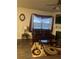 Living room with brown leather reclining furniture and area rug at 5396 Pennington Court, Atlanta, GA 30349