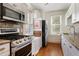 Galley kitchen with granite countertops and stainless appliances at 764 Edgewood Ne Ave # 8, Atlanta, GA 30307