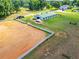 Equestrian property featuring an arena and spacious green pastures, ideal for horse enthusiasts at 1820 Walker Sw Rd, Conyers, GA 30094