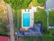 Aerial view of a large pool with a diving board and surrounding patio space at 1820 Walker Sw Rd, Conyers, GA 30094